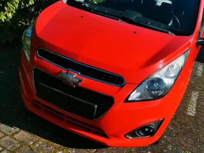 Używany Chevrolet Spark 68 KM (50 kW) 2013 Czerwony Hatchback
