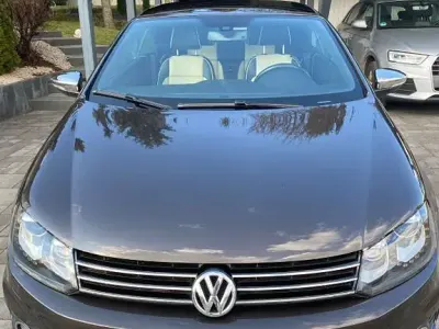 Używany VW Eos Exclusive 160 KM (117 kW) 2012 Brązowy Kabriolet