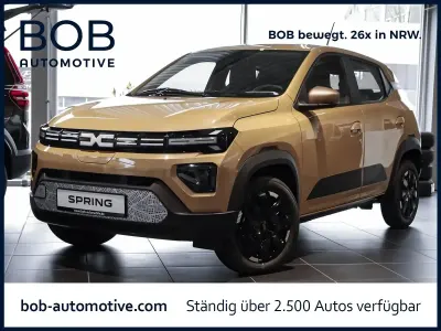 Gebraucht Dacia Spring Extreme 47 kW (65 PS) 2025 Safaribeige Kleinwagen