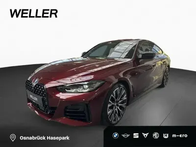Gebraucht BMW M440 M Sport 374 PS (275 kW) 2024 Aventurinrot iii (rot) Coupé