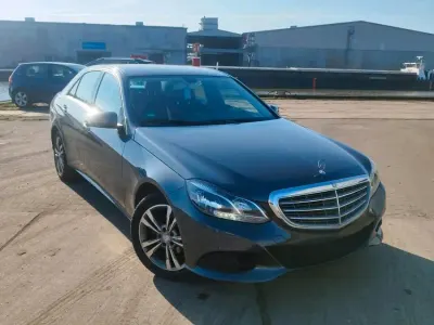 Second-hand Mercedes E200 136 CP (100 kW) 2014 Argintiu Berlinǎ
