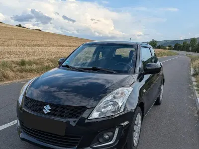 Gebraucht Suzuki Swift Club 94 PS (69 kW) 2015 Schwarz Kleinwagen
