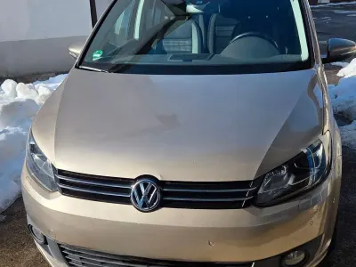 Second-hand VW Touran Life 140 CP (102 kW) 2013 Bej Monovolum