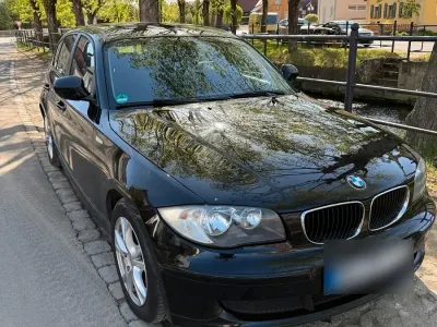 Używany BMW 116 116 KM (85 kW) 2011 Czarny Hatchback