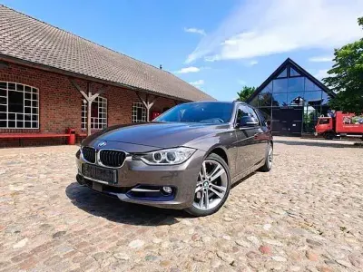 Gebraucht BMW 330 Sport Line 258 PS (189 kW) 2014 Havanna metallic Kombi