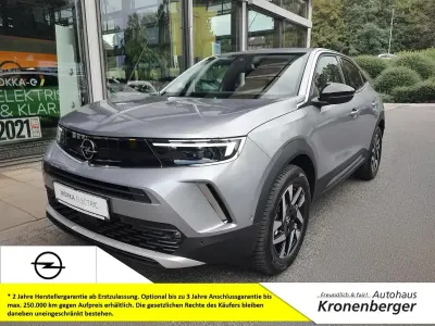 Używany Opel Mokka Elegance 100 kW (136 KM) 2023 Szary SUV