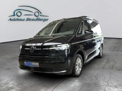 Gebraucht VW California Beach 150 PS (110 kW) 2025 Schwarzkeine angabe Van