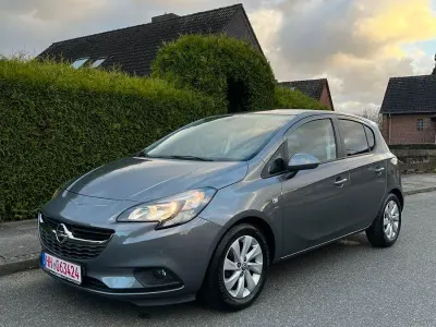 Używany Opel Corsa drive 90 KM (66 kW) 2016 Szary Hatchback