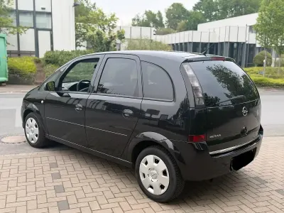 Używany Opel Meriva 90 KM (66 kW) 2006 Czarny Minivan