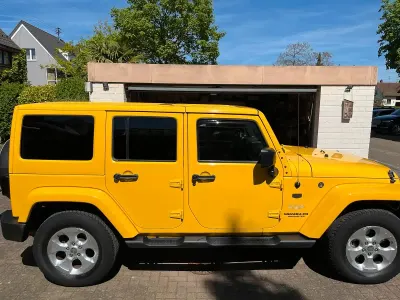 Gebraucht Jeep Wrangler Unlimited Sahara 200 PS (147 kW) 2015 Gelb SUV