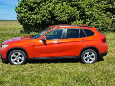 Gebraucht BMW X1 xLine 184 PS (135 kW) 2013 Orange SUV
