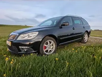 Używany Skoda Octavia RS 170 KM (125 kW) 2010 Czarny Kombi