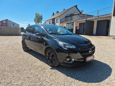 Używany Opel Corsa 101 KM (74 kW) 2015 Czarny Hatchback