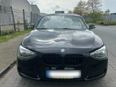 Second-hand BMW 116 136 CP (100 kW) 2012 Negru Hatchback