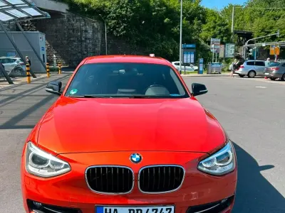 Gebraucht BMW 116 Sport Line 136 PS (100 kW) 2012 Orange Kleinwagen