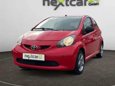 Używany Toyota Aygo Basis 68 KM (50 kW) 2006 Czerwony Hatchback