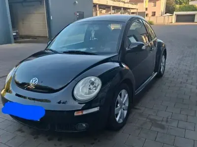 Gebraucht VW New Beetle 75 PS (55 kW) 2007 Schwarz Kleinwagen