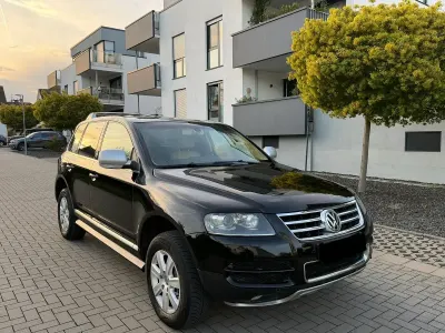 Second-hand VW Touareg Individual 224 CP (164 kW) 2006 Negru SUV