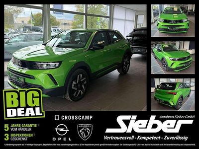 Gebraucht Opel Mokka Elegance 101 PS (74 kW) 2024 Lackierung matcha green/typ au SUV