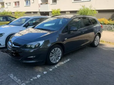 Gebraucht Opel Astra 120 PS (88 kW) 2014 Grau Kombi