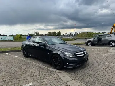 Gebraucht Mercedes C180 AMG line 156 PS (114 kW) 2012 Schwarz Coupé