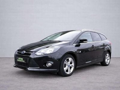 Gebraucht Ford Focus Champions Edition 125 PS (91 kW) 2013 Pantherschwarz metallic Kombi