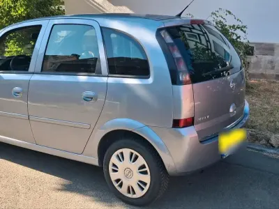 Gebraucht Opel Meriva 105 PS (77 kW) 2009 Silber Van / Kleinbus