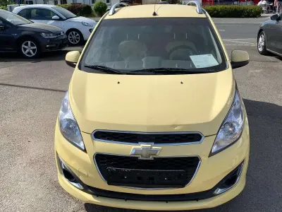 Second-hand Chevrolet Spark LTZ 82 CP (60 kW) 2013 Galben Hatchback