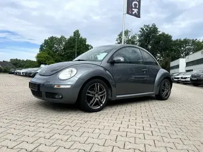 Gebraucht VW New Beetle 102 PS (75 kW) 2010 Platinum grey metallic Kleinwagen