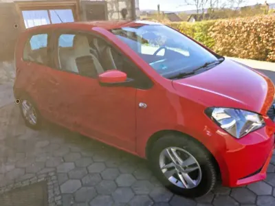 Używany Seat Mii Style 60 KM (44 kW) 2013 Czerwony Hatchback
