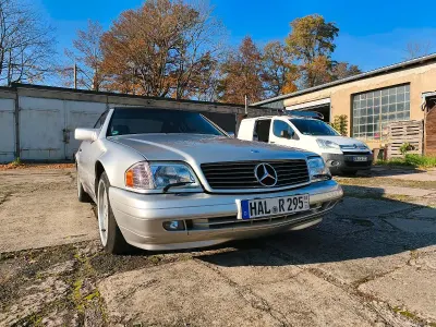 Second-hand Mercedes SL320 AMG 232 CP (170 kW) 1996 Argintiu Cabrio