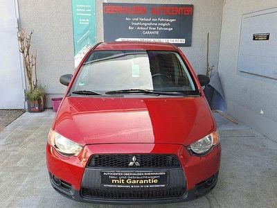 Begagnad Mitsubishi Colt Inform 75 HK (55 kW) 2009 Röd Halvkombi