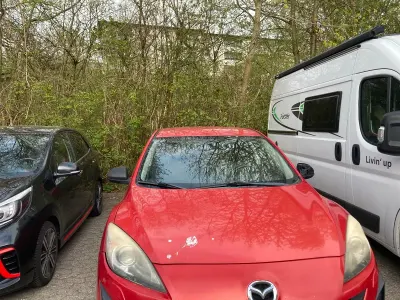 Second-hand Mazda 3 150 CP (110 kW) 2009 Roșu Berlinǎ