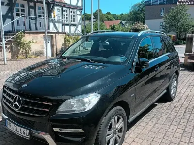 Używany Mercedes ML250 204 KM (150 kW) 2011 Czarny SUV