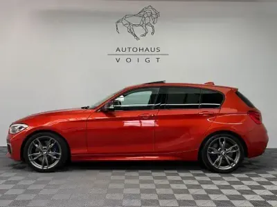 Second-hand BMW M140 M Sport 340 CP (250 kW) 2017 Portocaliu Hatchback