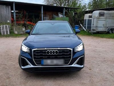 gebraucht Audi Q2 S line 35 TFSI 110 kW S tronic navarrablau metallic 2021