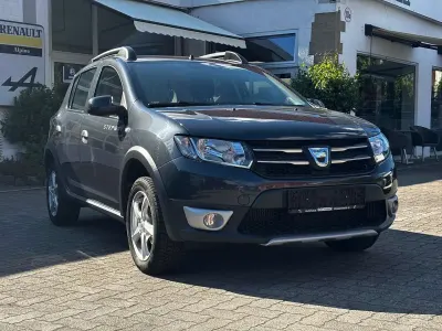 Gebraucht Dacia Sandero Prestige 90 PS (66 kW) 2016 Kometengrau metallic Kleinwagen