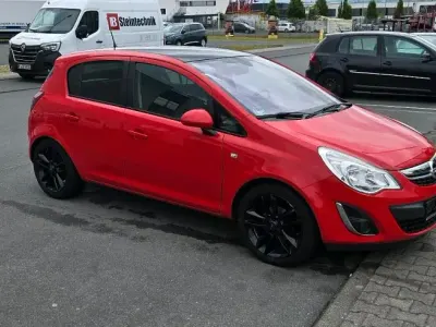 Gebraucht Opel Corsa 87 PS (63 kW) 2011 Rot Kleinwagen