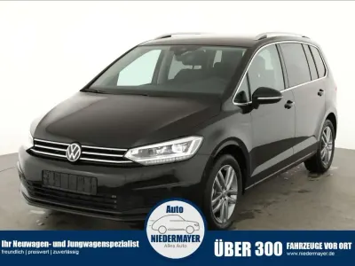 Neu VW Touran Comfortline 150 PS (110 kW) 2025 Grenadill black metallic Van / Kleinbus