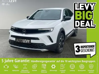 Gebraucht Opel Mokka-e Ultimate 100 kW (136 PS) 2023 Weiss banquise/typ aussenverkleidung spi (metallic) SUV