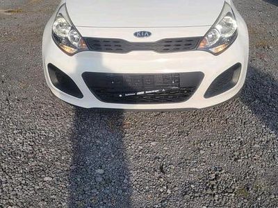 Second-hand Kia Rio 85 CP (62 kW) 2011 Alb Berlinǎ