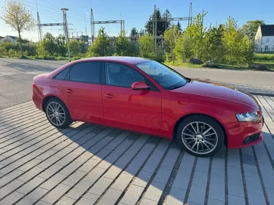 Używany Audi A4 Ambiente 120 KM (88 kW) 2010 Czerwony Sedan/Limuzyna