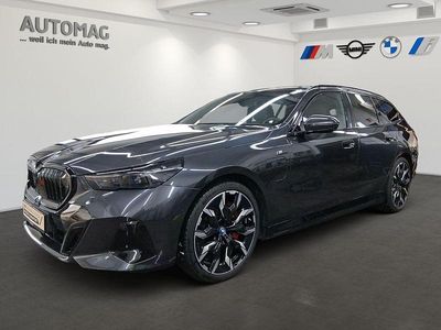 Second-hand BMW 550e Sport Line 489 CP (359 kW) 2024 Gri Break