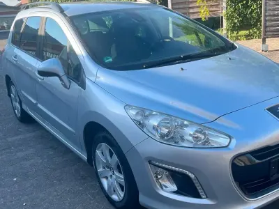 Gebraucht Peugeot 308 120 PS (88 kW) 2011 Grau Kombi