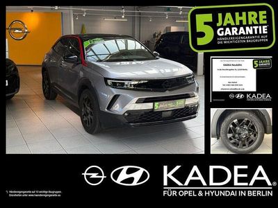Kontrast grau/quarz silber (metallic) Gebraucht 2023 Opel Mokka-e SUV | 17.990 € (Guter Preis)