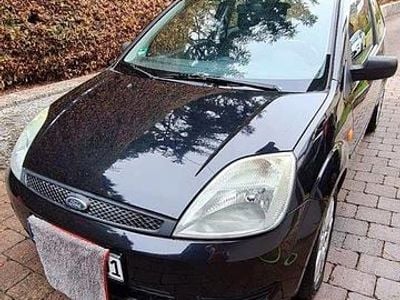 Second-hand Ford Fiesta Futura 69 CP (50 kW) 2004 Negru Hatchback