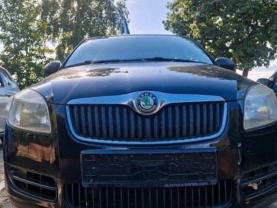 Second-hand Skoda Fabia 60 CP (44 kW) 2011 Negru Berlinǎ