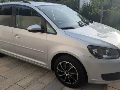 Gebraucht VW Touran Comfortline 140 PS (102 kW) 2013 Silber Van / Kleinbus