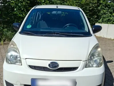 Gebraucht Daihatsu Cuore 69 PS (50 kW) 2011 Weiß Kleinwagen
