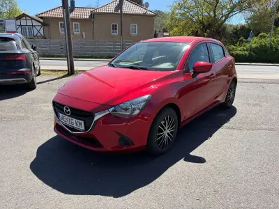 Gebraucht Mazda 2 Center-Line 75 PS (55 kW) 2015 Rubinrot metallic Kleinwagen